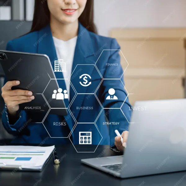 imgi_38_woman-using-mobile-phone-modern-office-with-laptop-digital-